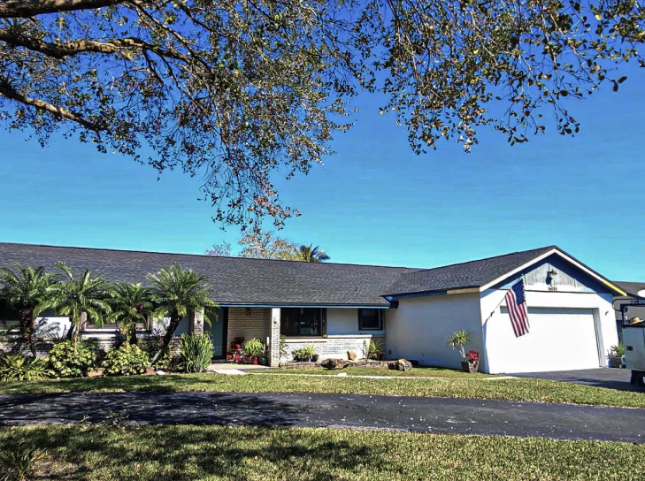 residential house with newly installed shingle roofing